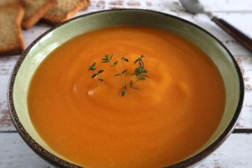 Carrot soup on a soup bowl