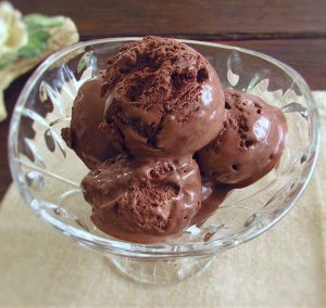 Chocolate ice cream on a glass bowl