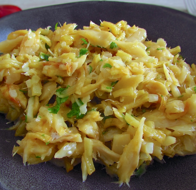 Salt cod, potatoes and eggs on a dish bowl