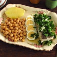 Cooked chickpeas with cod on a platter