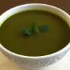 Creamy spinach soup on a soup bowl