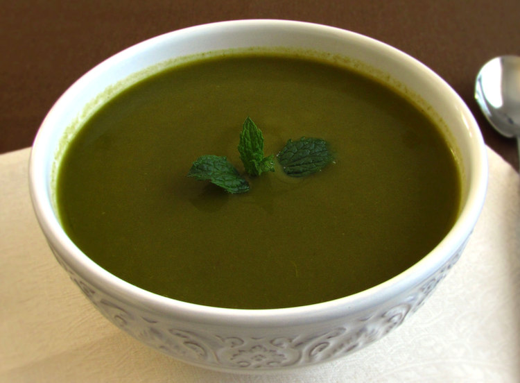 Creamy spinach soup on a soup bowl