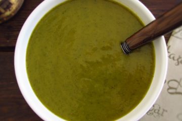 Creamy watercress soup on a soup bowl