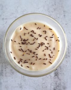Honey ice cream on a glass bowl