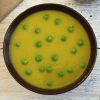 Pea puree soup on a soup bowl