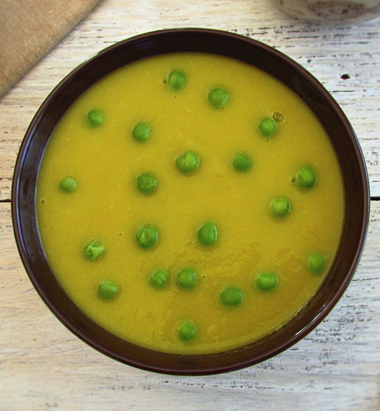 Pea puree soup on a soup bowl