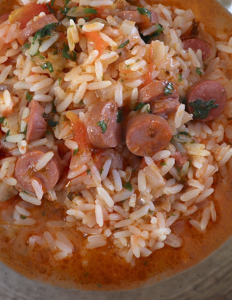 Rice with sausages on a dish bowl