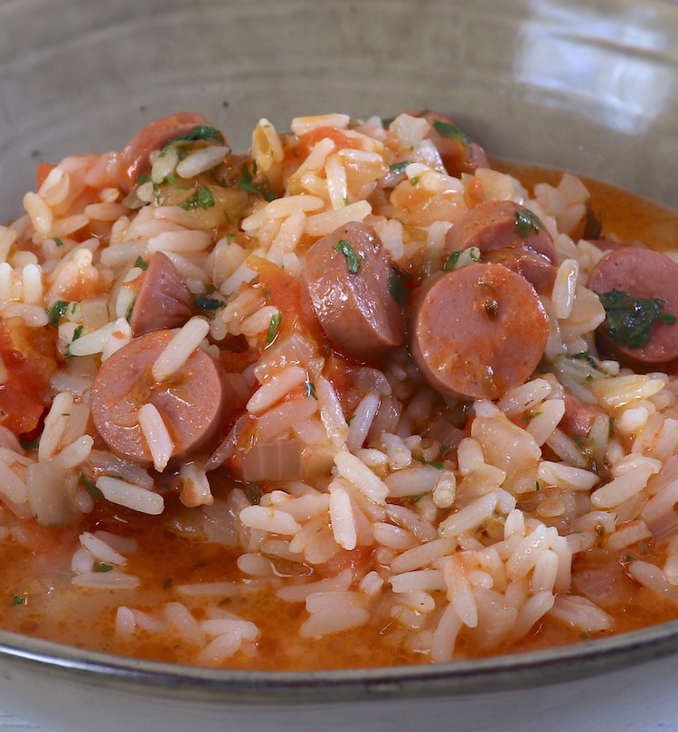 Rice with sausages on a dish bowl