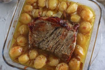 Traditional roast veal on a glass baking dish
