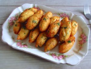 Salt cod fritters on a serving plate