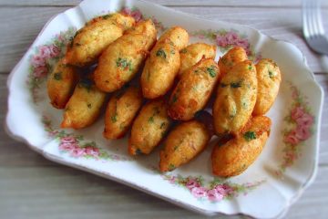 Salt cod fritters on a serving plate