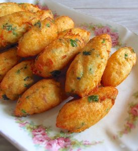 Salt cod fritters in a rectangular platter