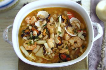 Seafood with white beans on a tureen