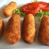 Shrimp and ham croquettes on a plate with salad