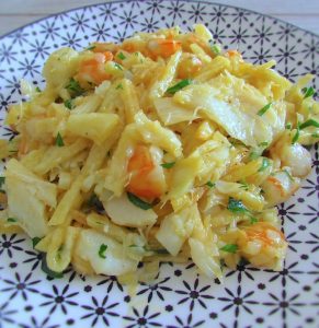 Salt cod, potatoes, eggs and shrimp on a plate
