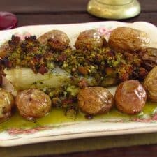 Cod with Portuguese cornbread and potatoes on a platter