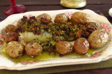 Cod with Portuguese cornbread and potatoes on a platter