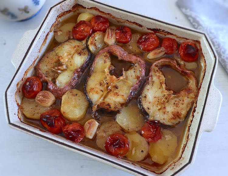 Baked ling fish on a baking dish