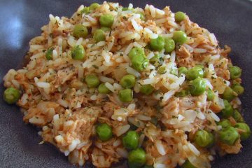 Rice with tuna and peas on a dish bowl