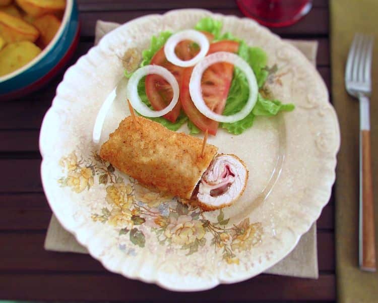 Breaded stuffed steak on a plate