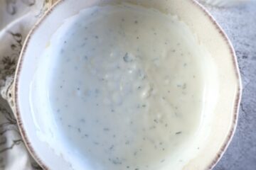 Garlic yogurt sauce in a dish bowl