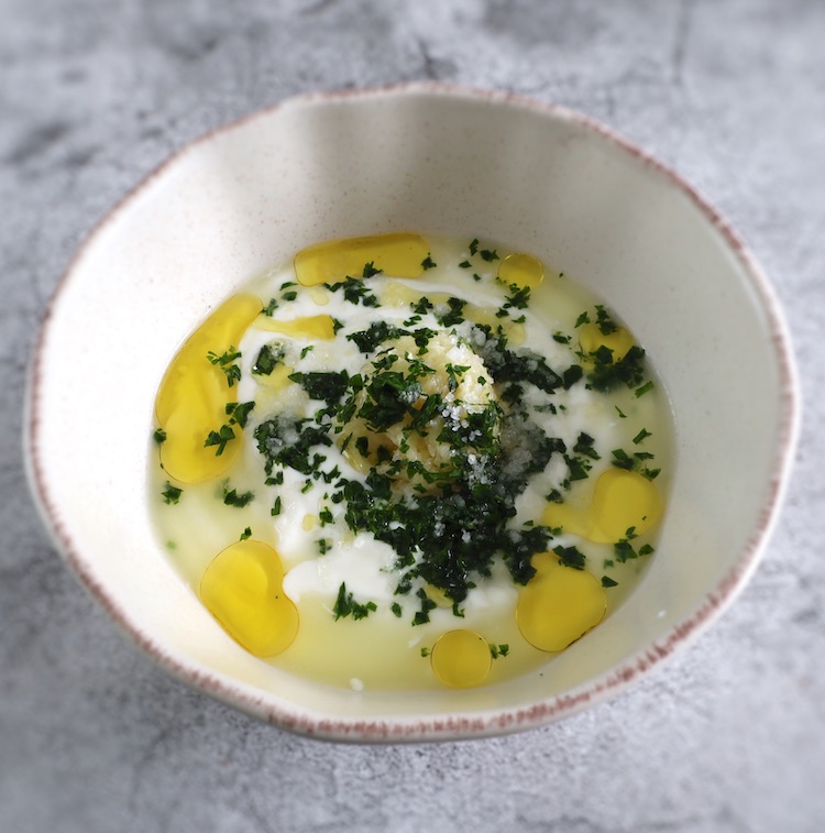Garlic yogurt sauce in a dish bowl