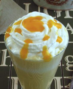 Mango milkshake on a glass cup