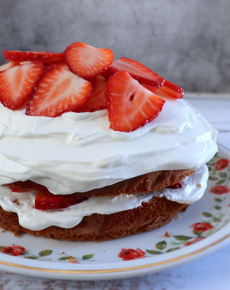 Strawberry cream cake on a plate