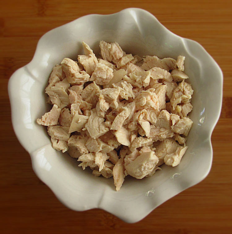 Chicken cut in small pieces in a bowl