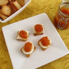 Pumpkin jam with toasts on a plate