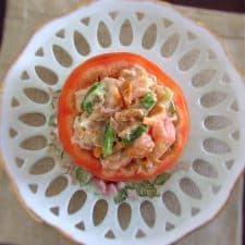 Stuffed tomatoes with tuna on a plate