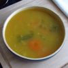Vegetable soup with savoy cabbage on a soup bowl