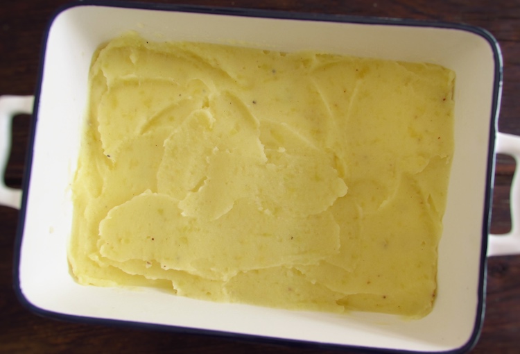 A layer of puree on a baking dish
