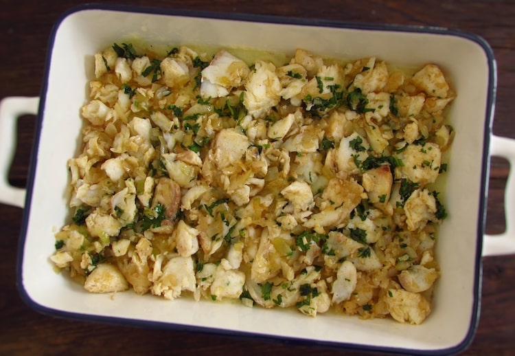 A layer of fish on a baking dish