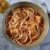Pork stew with spaghetti on a dish bowl