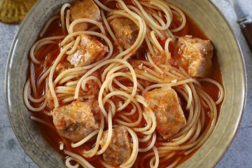 Pork stew with spaghetti on a dish bowl