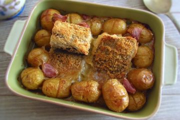 Baked breaded cod on a baking dish
