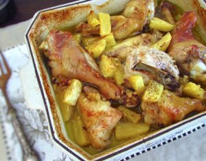 Chicken with pineapple on a baking dish