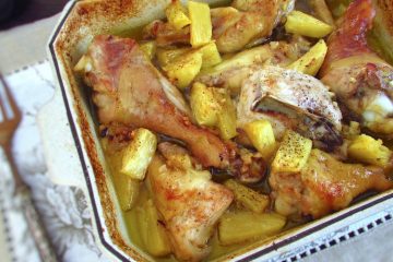 Chicken with pineapple on a baking dish