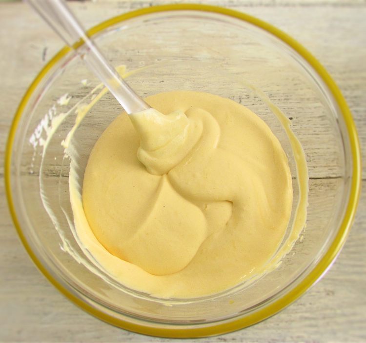 mango cream on a glass bowl