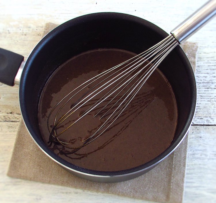 Brown sugar, flour and milk mixed in a saucepan