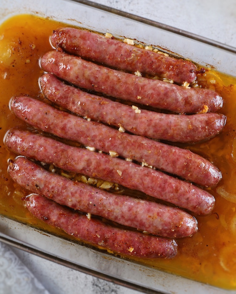 Easy baked fresh sausages on a glass baking dish