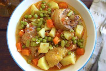 Hearty chicken stew on a dish bowl