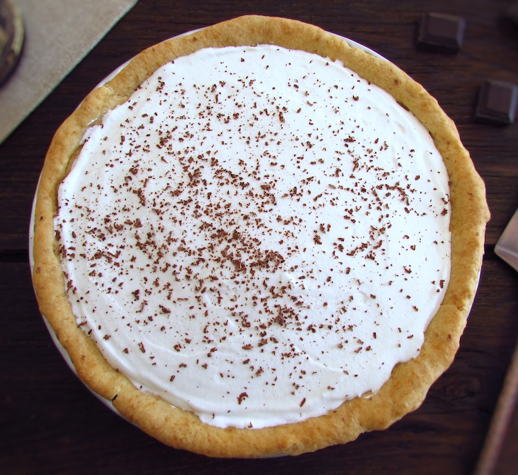 Chocolate chantilly pie on a wooden table