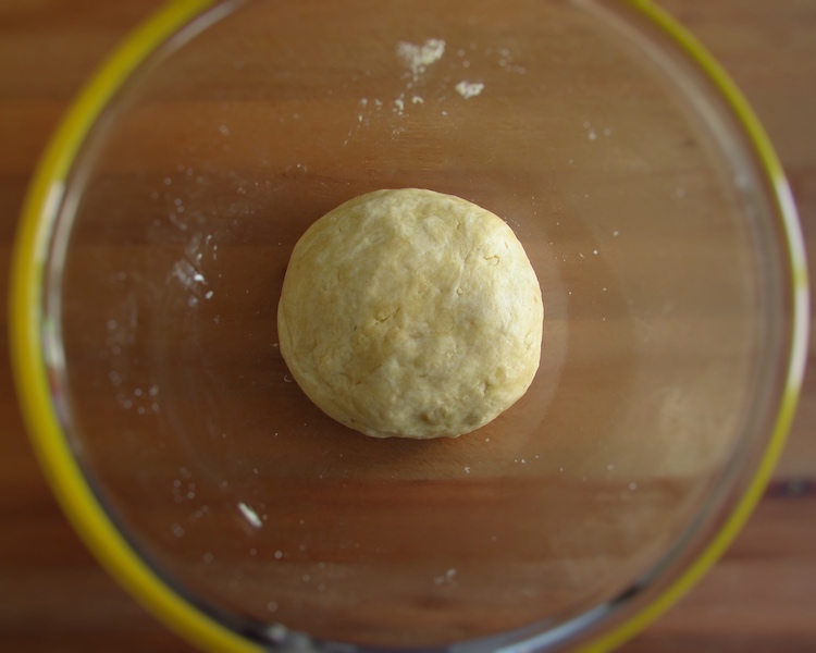 Pie dough on a glass bowl