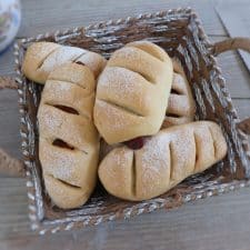 Portuguese chouriço bread on a bread basket
