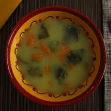 Collard greens soup on a soup bowl