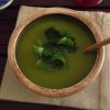 Coriander soup on a soup bowl