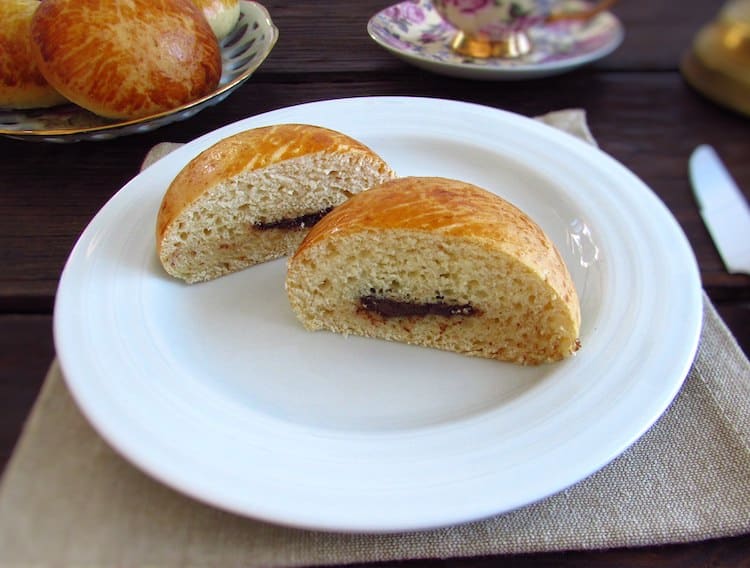 Milk bread filled with chocolate on a plate