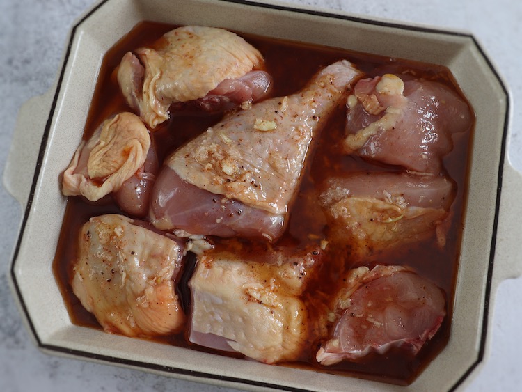 Chicken with honey sauce on a baking dish